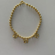 Bow charm necklace