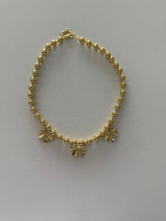 Bow charm necklace