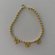 Bow charm necklace