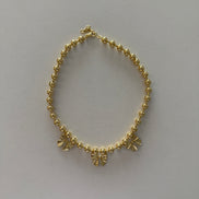 Bow charm necklace