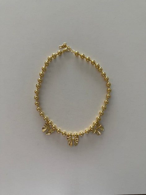 Bow charm necklace
