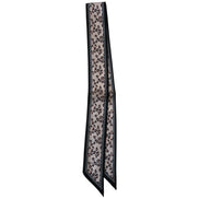 Beige leopard print scarf with black border on a white background
