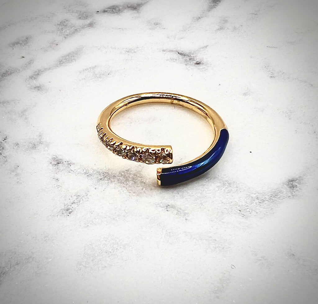 Gold navy blue ring with micro pave diamonds that can be adjusted to any size