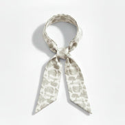 Grey/Beige (greige) floral toile patterned scarf on a white background