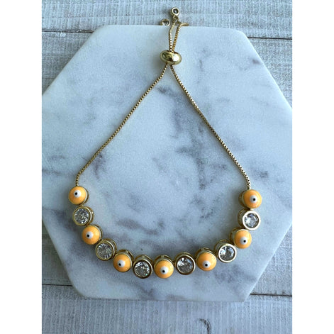 Orange Gold Evil Eye Adjustable 14k gold plated bracelet